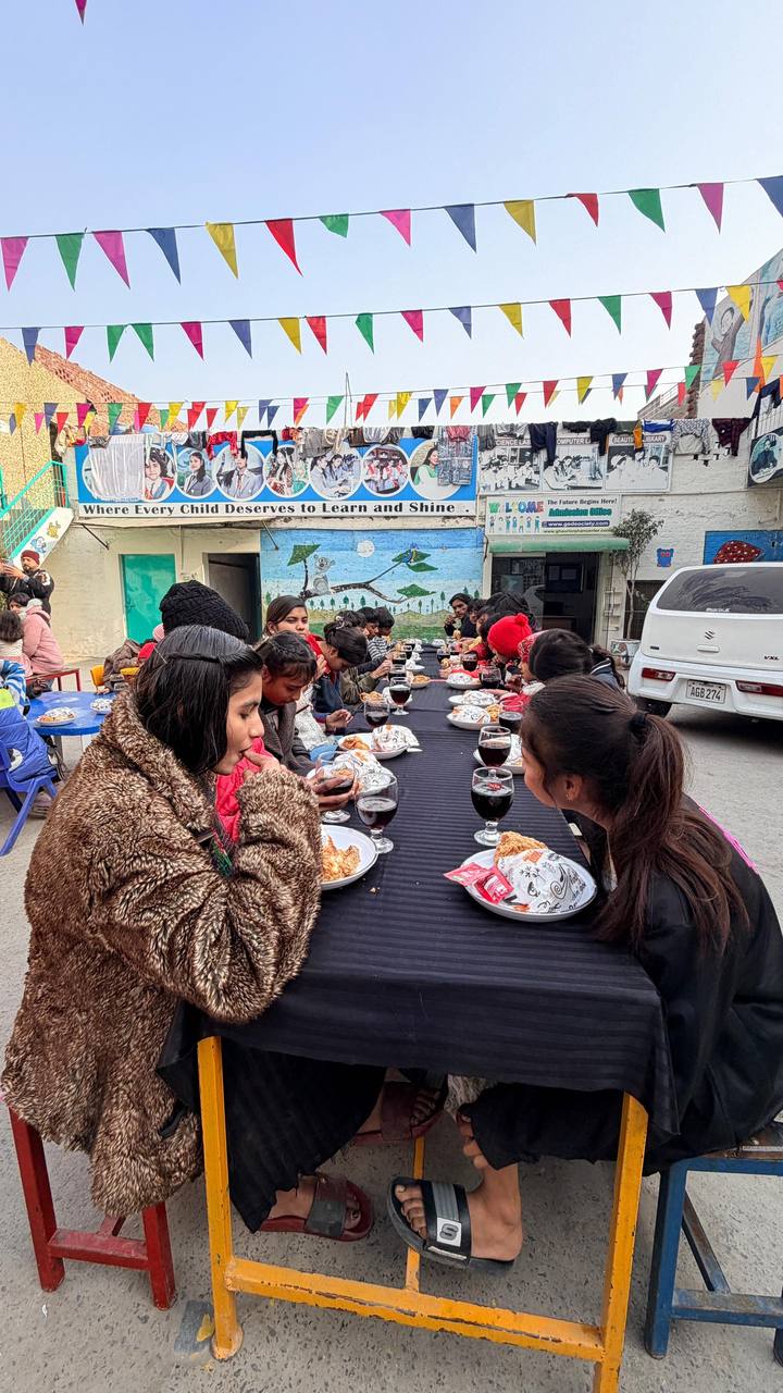 Volunteer distributing relief meal packages